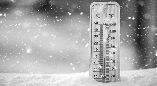 Thermometer in snow.