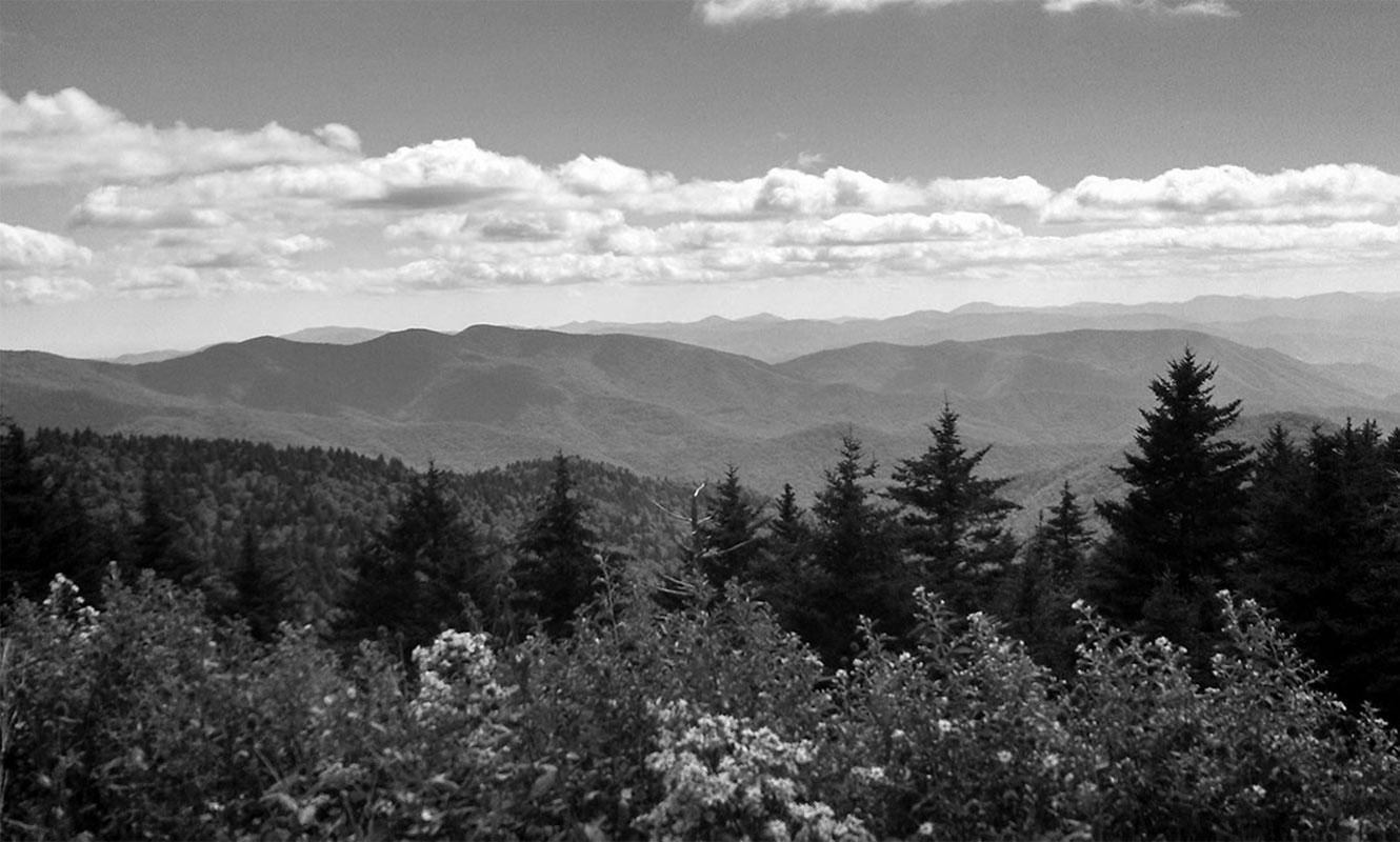 Daytime view of mountains and clouds