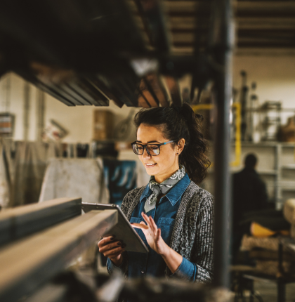 Worker looking at tablet.