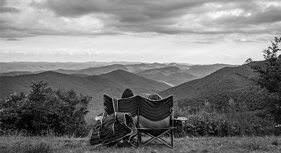 Couple Sitting Overlooking Looking Glass Falls