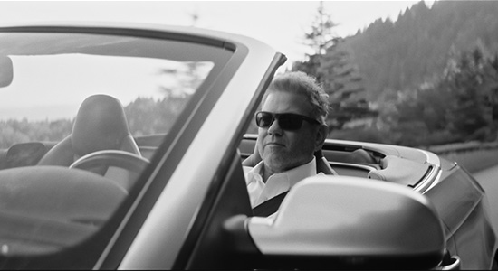 Man driving convertible in the Blue Ridge Mountains of Western North Carolina